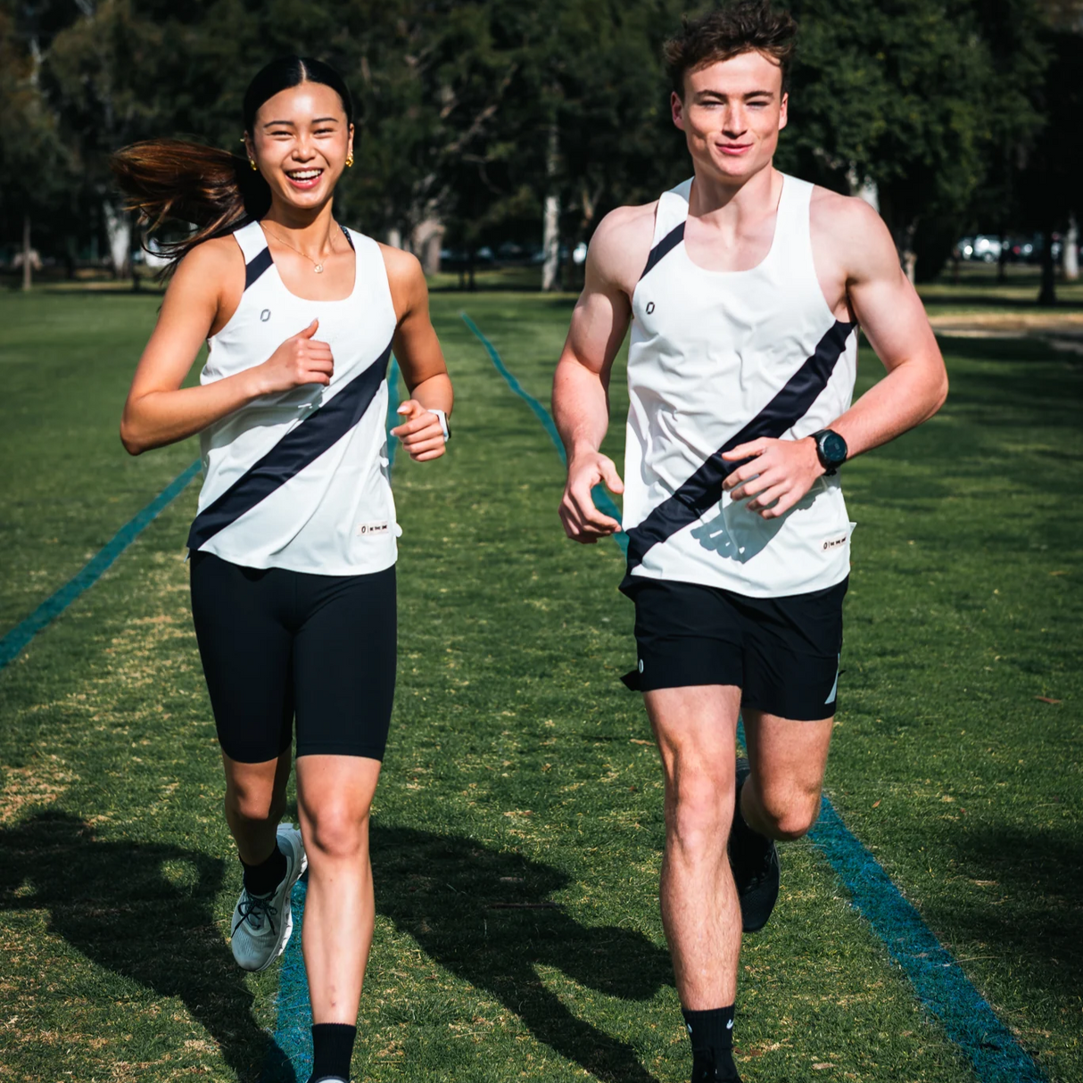 One Running - One Running Women's Victory Speed Tech Singlet Eclipse - Cam2